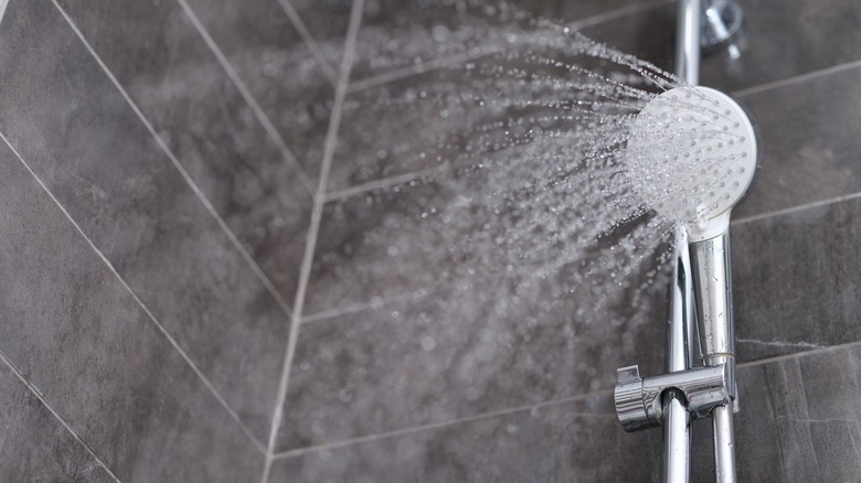 shower head spraying water