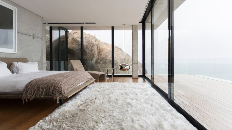 Shag rug in a chic modern bedroom.