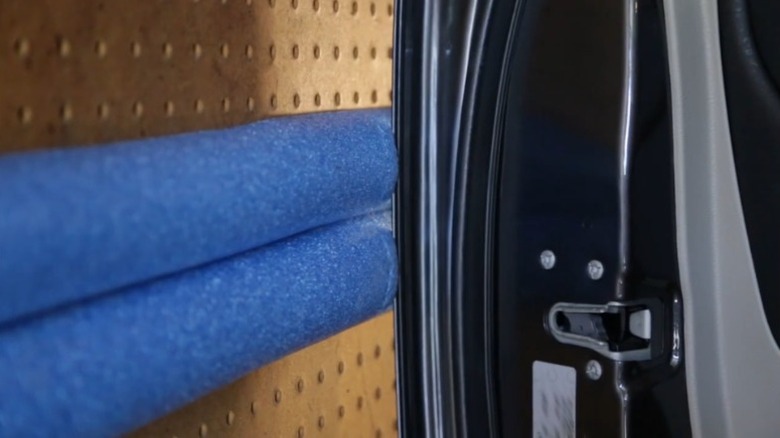 Pool noodle stopping car door