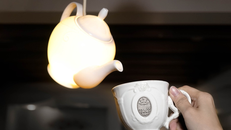 A hanging teapot lamp