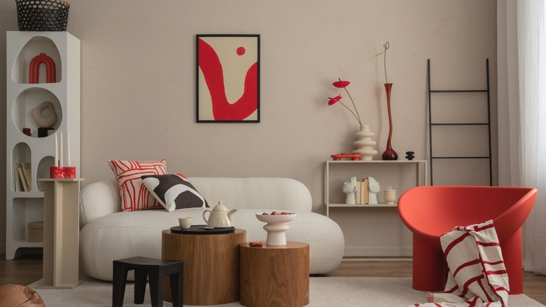 living room with red decor