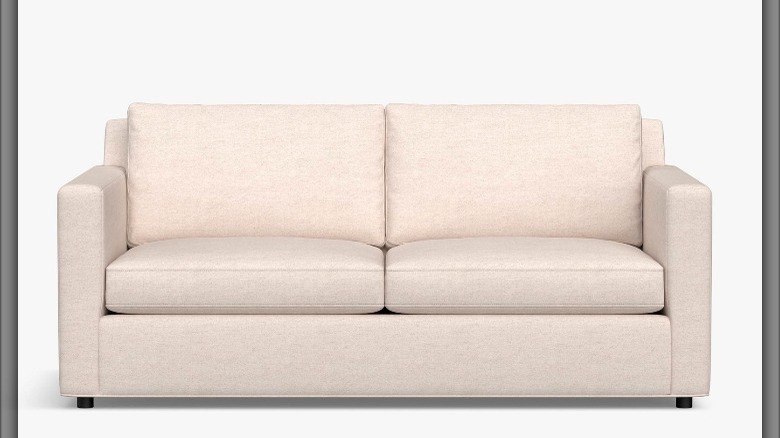 cream colored two cushion sofa