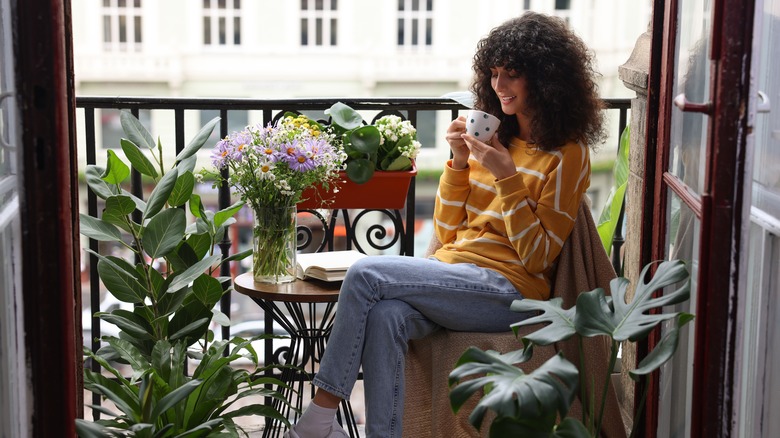 Woman enjoying her balcony