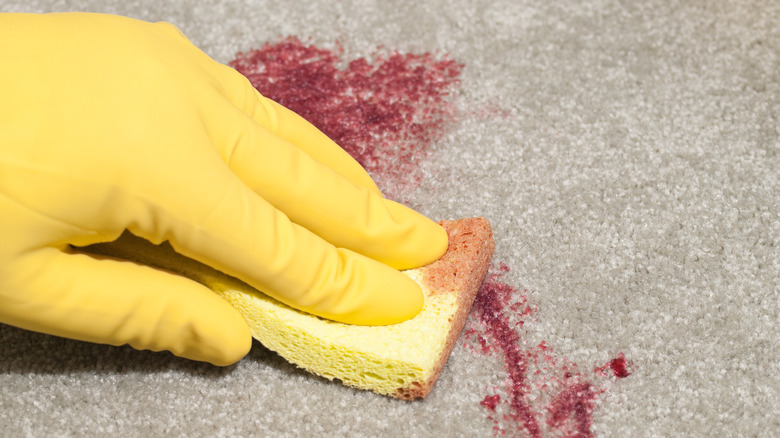 Sponge cleaning red wine