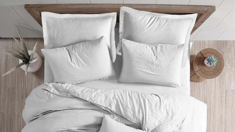 Bed with white pillows