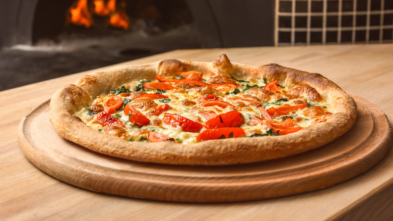 pizza on a cutting board