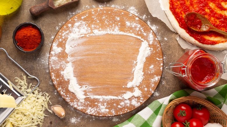 flour on a pizza stone 