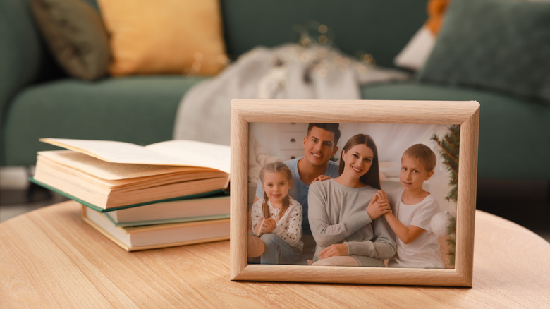 framed family photograph on table