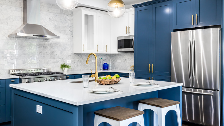 blue kitchen with white accents