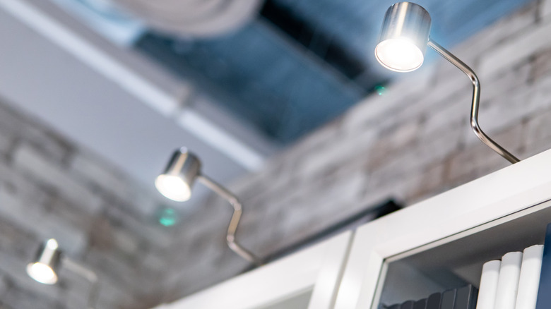 lights above built-in bookshelf