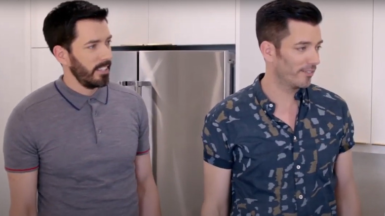 Drew and Jonathan Scott in kitchen