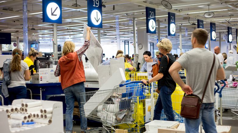 People checking out at IKEA