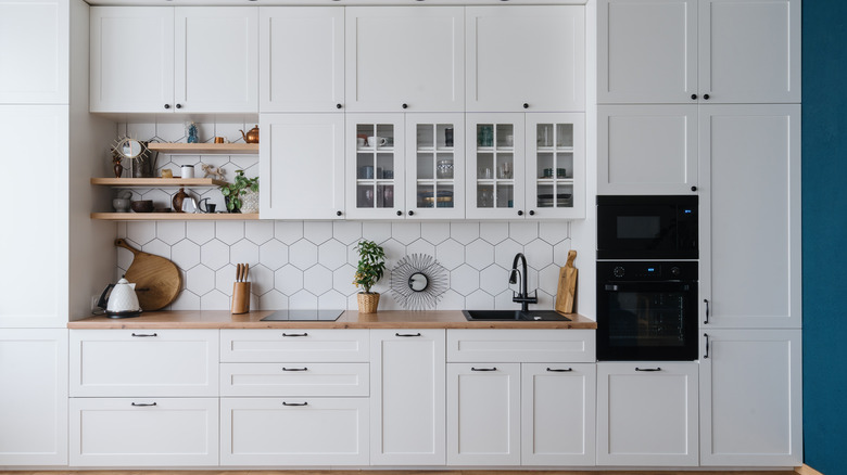 Modern kitchen with white cabinets