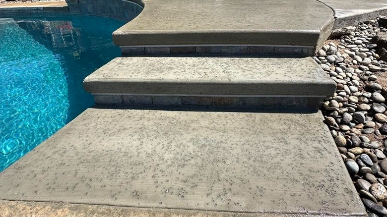 Salted concrete steps near pool