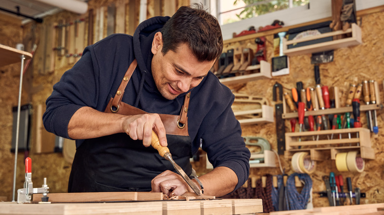 woodworker using a chisel