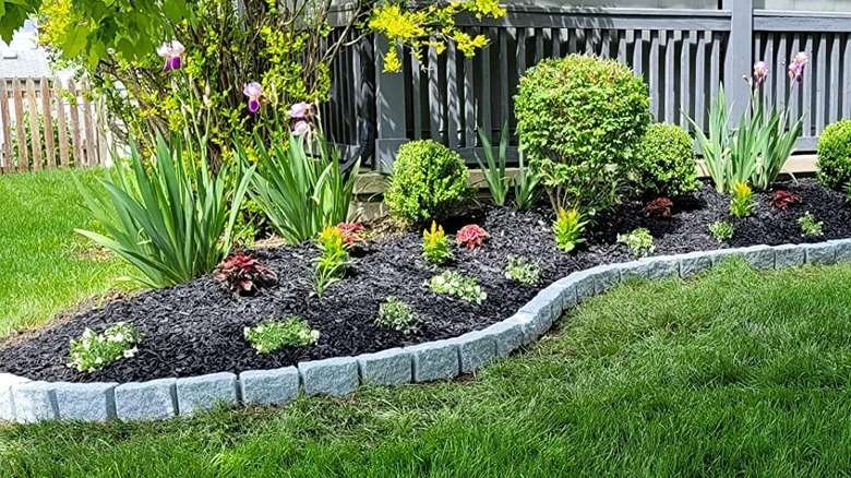 Beuta blocks used as border edging alongside a lawn