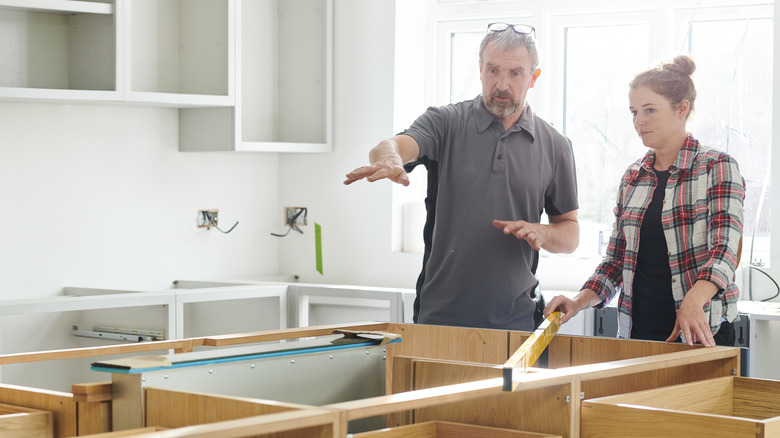 pair installing kitchen countertops