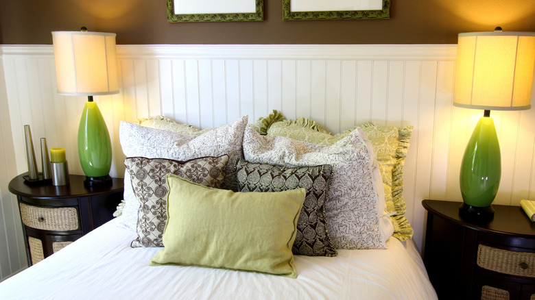 A beadboard accent wall in the bedroom