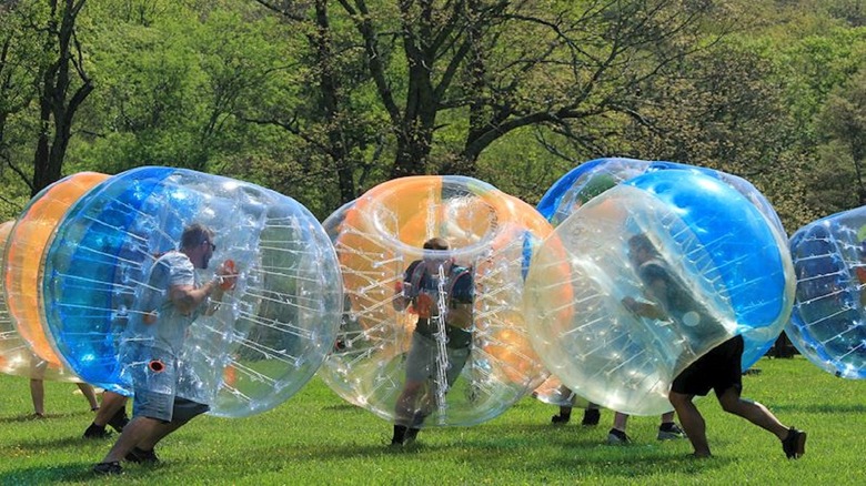 peole playing bubble ball