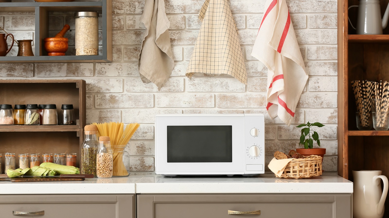 https://www.housedigest.com/img/gallery/the-right-place-to-put-your-microwave/l-intro-1665173809.jpg