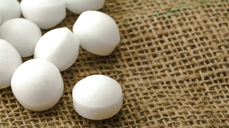 mothballs on natural fabric