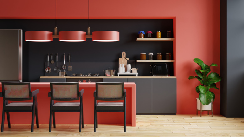 Alley kitchen with red cabinets