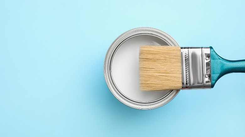 Paintbrush on paint can