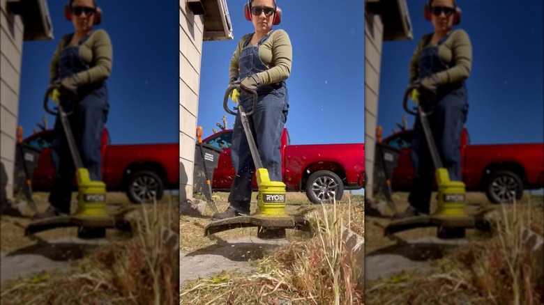 woman trimming weeds with Ryobi trimmer