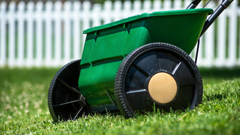 fertilizer spreader on grass