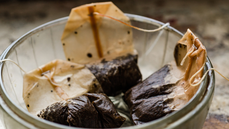 used tea bags in bowl