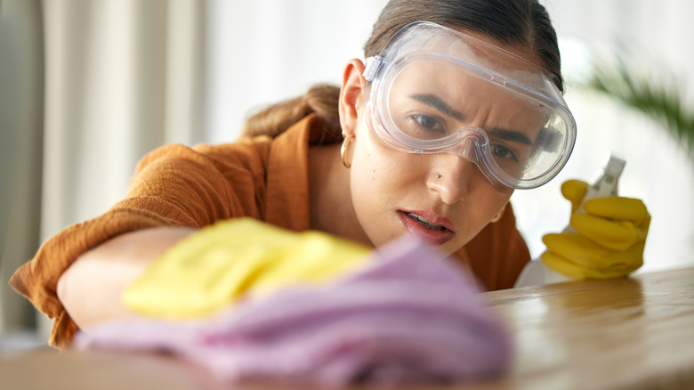 Cleaning wearing goggles and gloves
