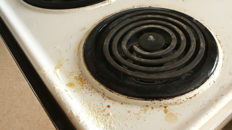 The Secret To Cleaning Your Stove May Be Just A Lift Away