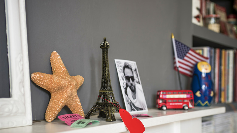 A shelf holds travel memorabilia