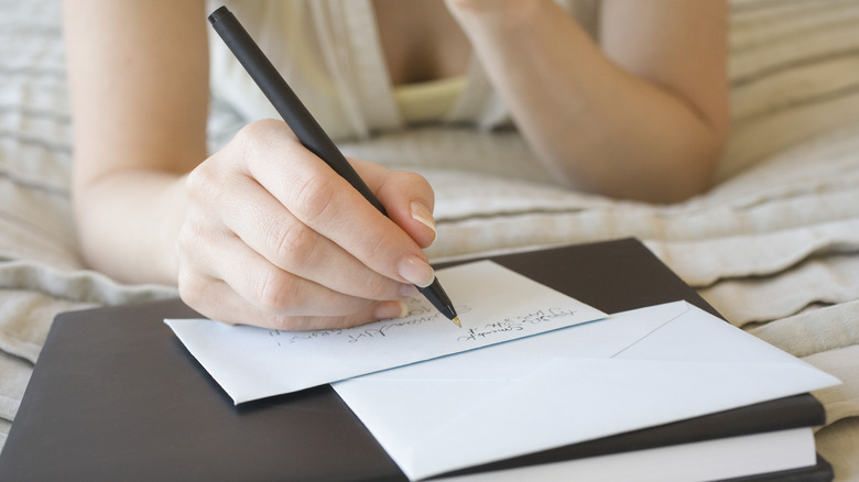 Woman writing a letter