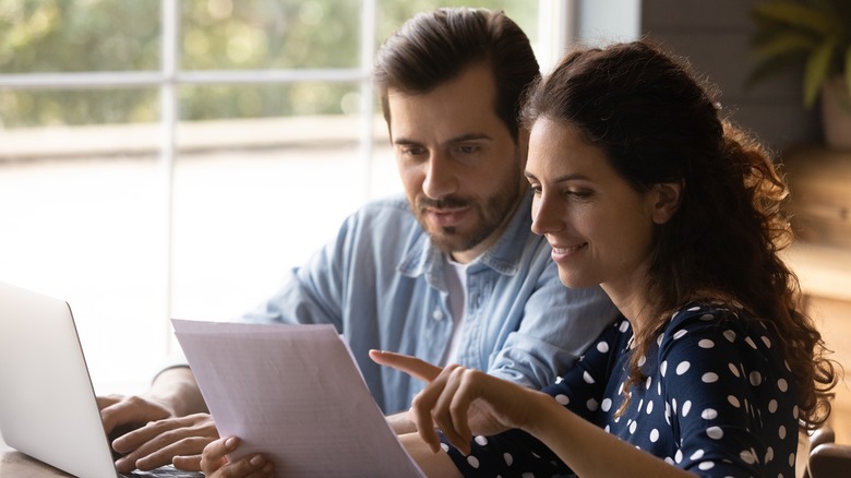 A couple reviewing documents