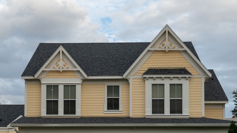 house with scalloped gables