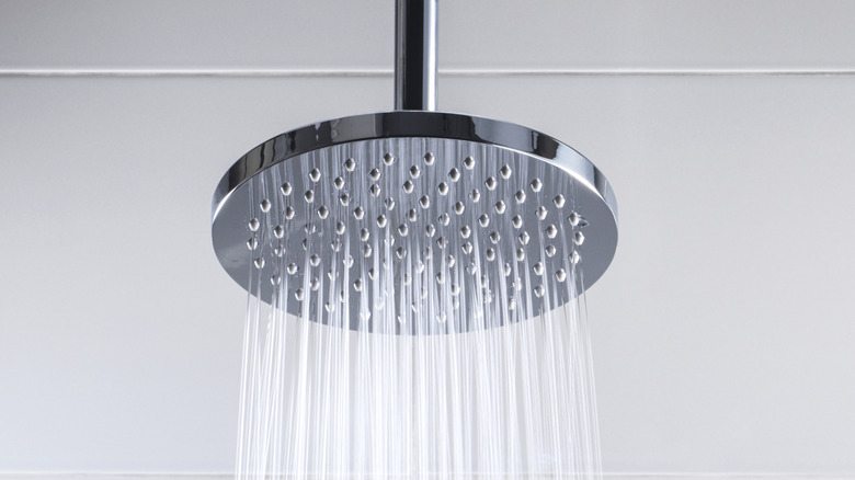 An shower head spraying water