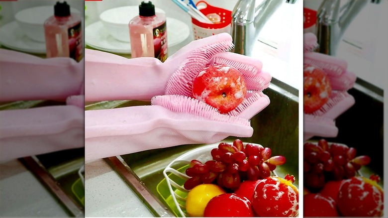 Scrubbing fruit with silicone gloves