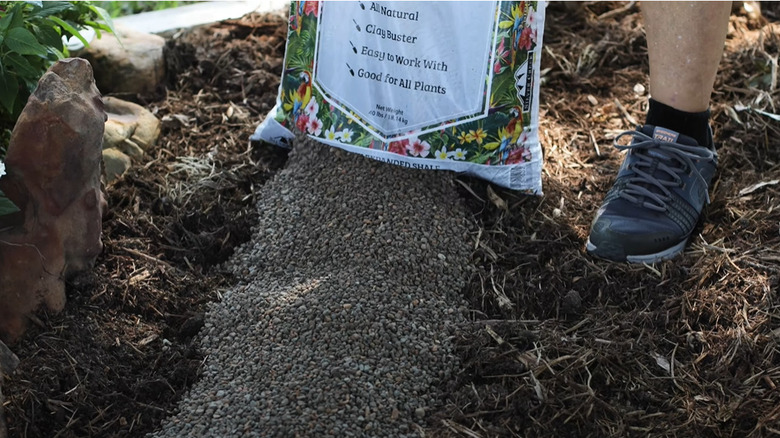 pouring expanded shale in garden