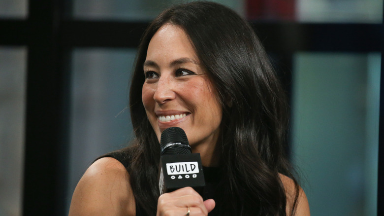 joanna gaines with microphone