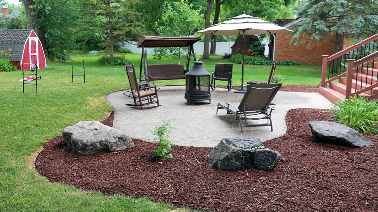 mulched garden in backyard patio 