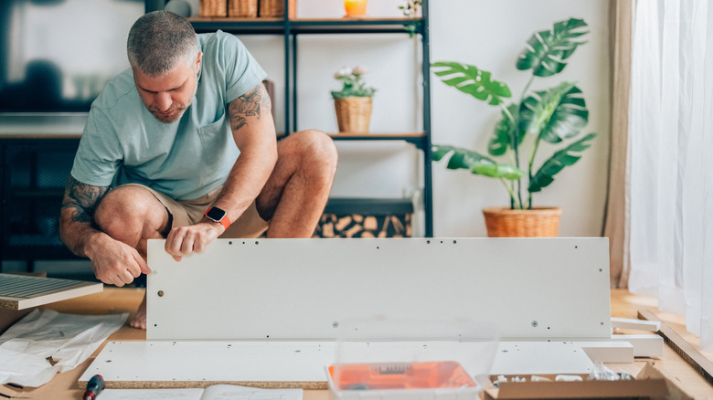 A man working on an IKEA DIY