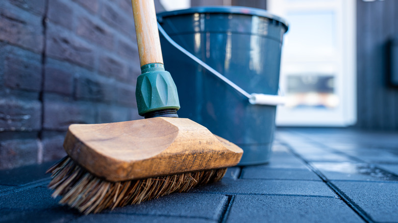 Brush and bucket on concrete