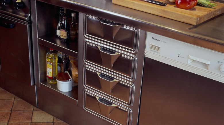 Close up of metal storage system in a kitchen.