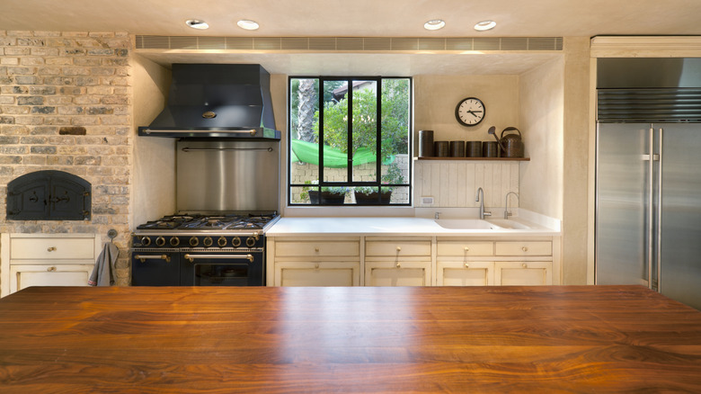 Wooden kitchen island top in modern kitchen