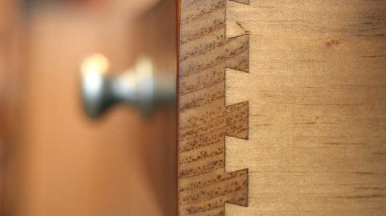 A dovetail joint on wood drawer