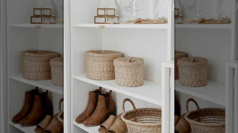 White bookcase with baskets