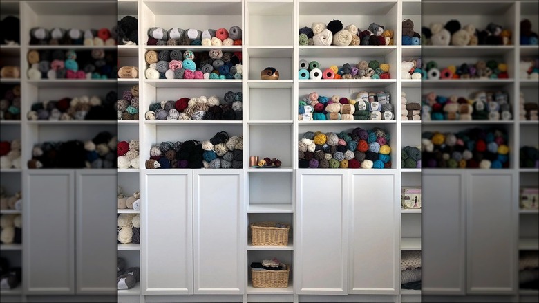 Yarn on gray bookcases