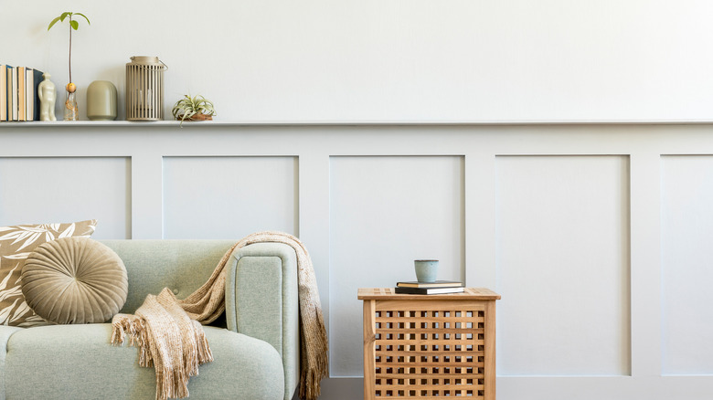 Ledge with books behind couch