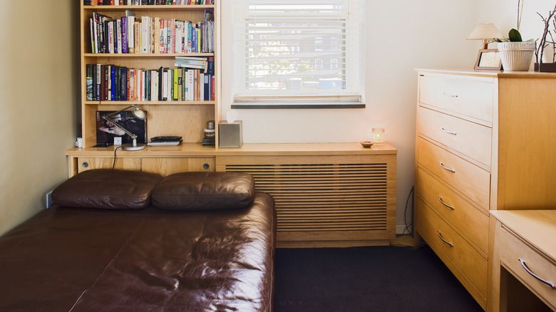 Small bedroom with bookshelf